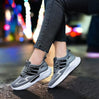 Grey running sneakers, air cushioning, elastic closure lightweight stretchable design