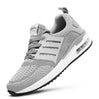 Fashionable, stylish, sport shoes, running shoes, everyday sneakers, breathable design, aircushioning, heel support, elastic closure, easy slip in. grey trainers